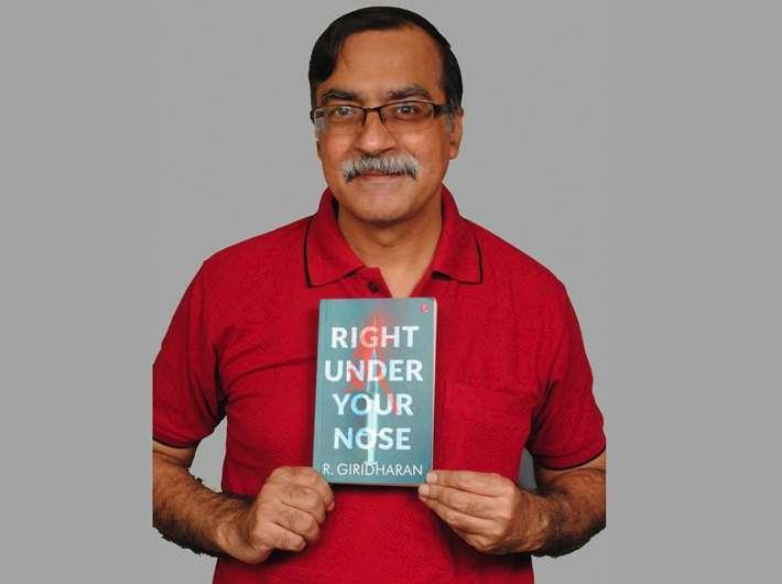 R Giridharan, a general manager at RBI has come out with his debut novel titled Right Under our Nose.
